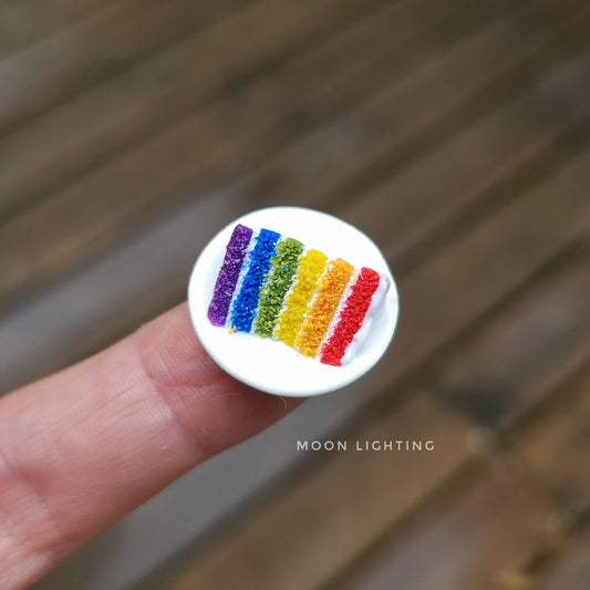 Slice of rainbow cake