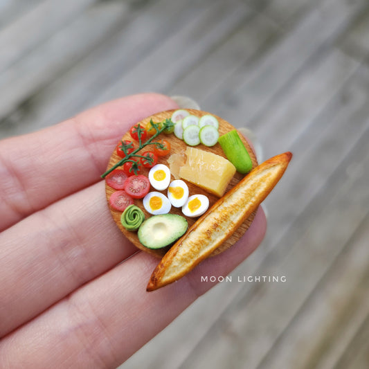 Baguette board with tomatoes, eggs etc