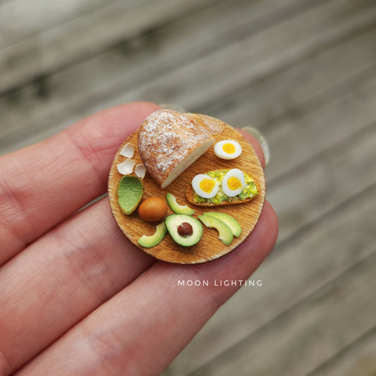 Avocado toast with eggs on round board