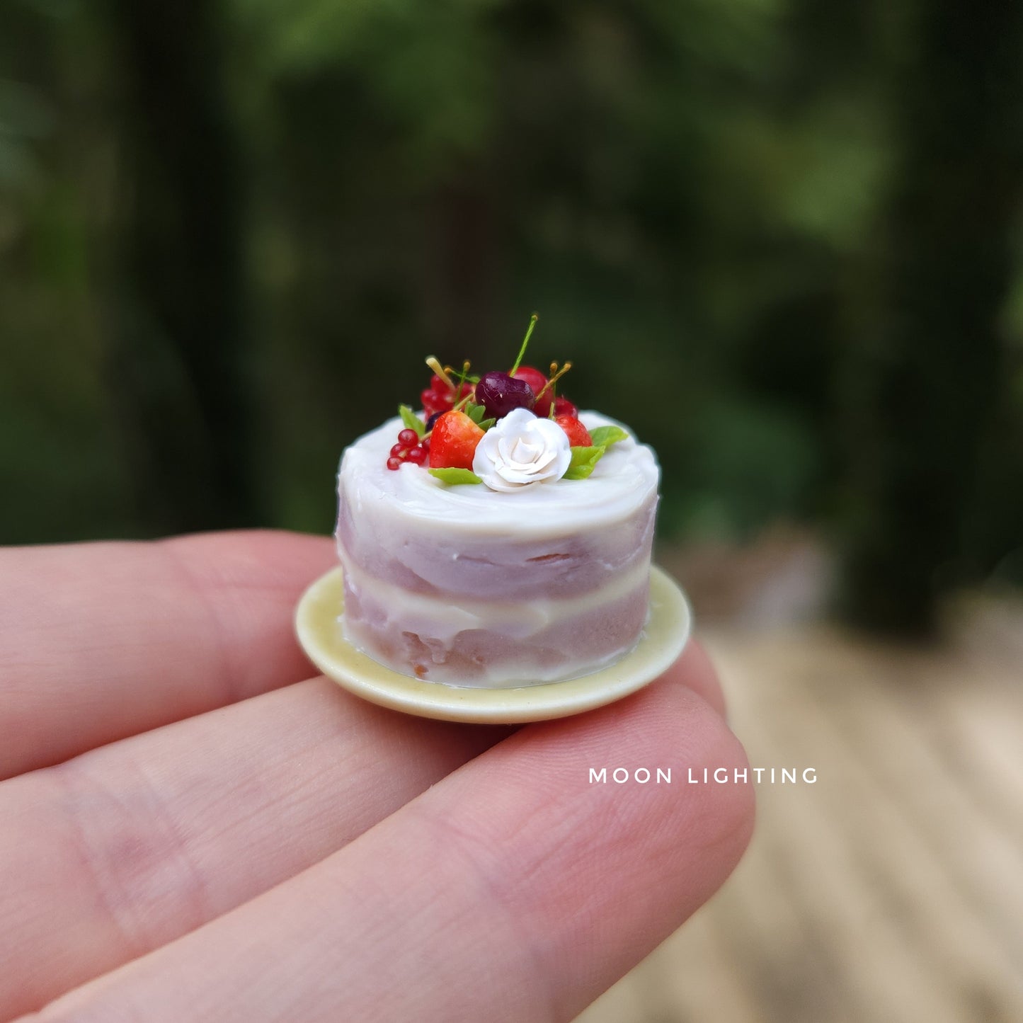 Cake with berries and rose