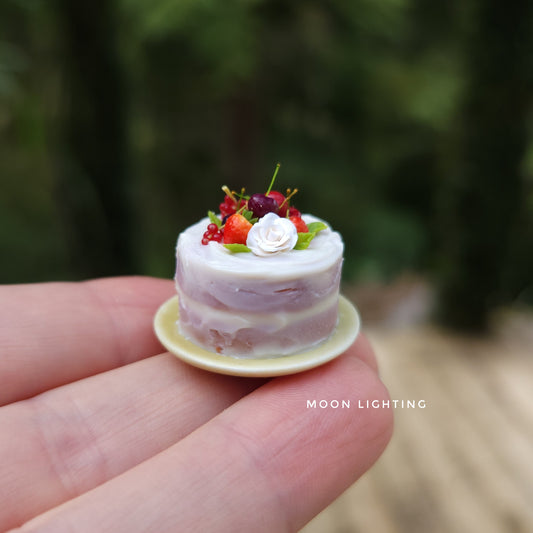 Cake with berries and rose