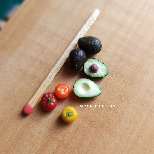 Set of avocados and tomatoes