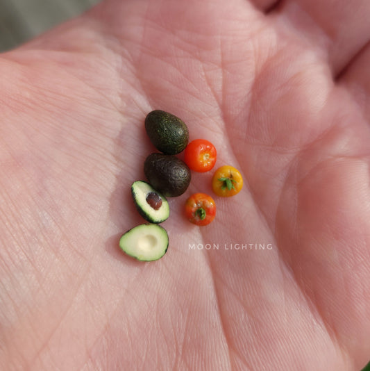 Set of avocados and tomatoes